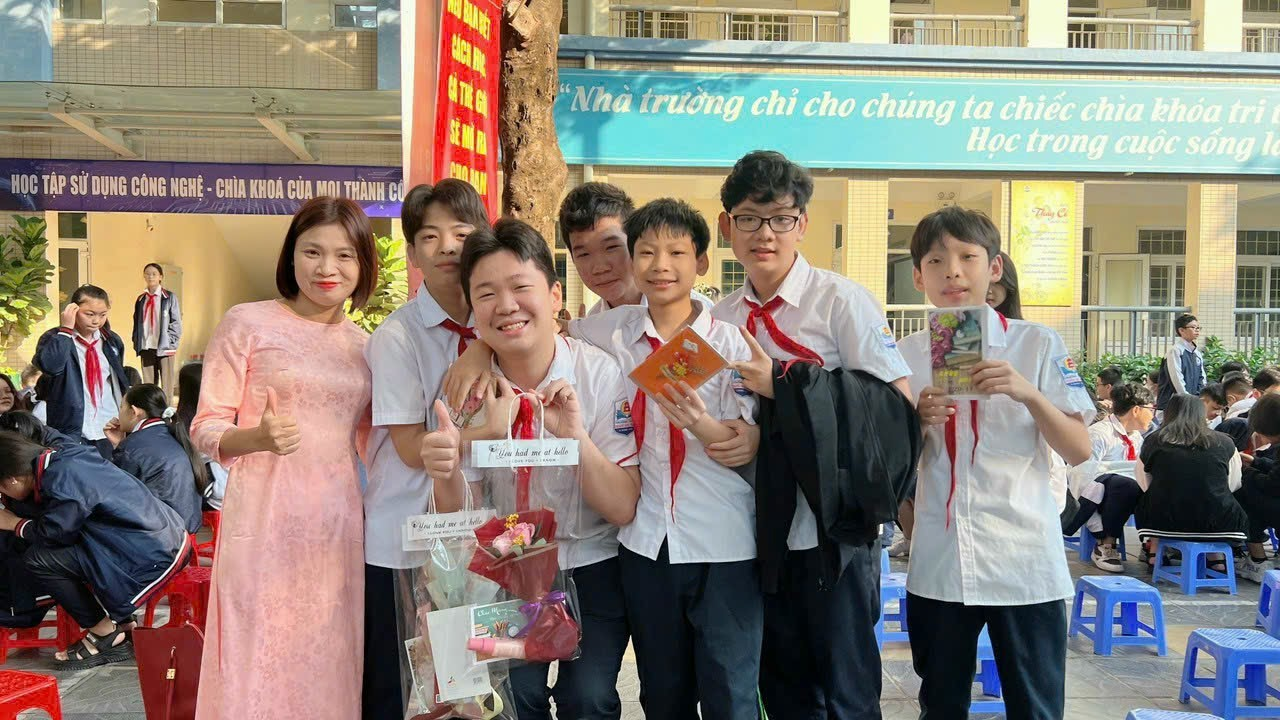 A group of people posing for a photoDescription automatically generated