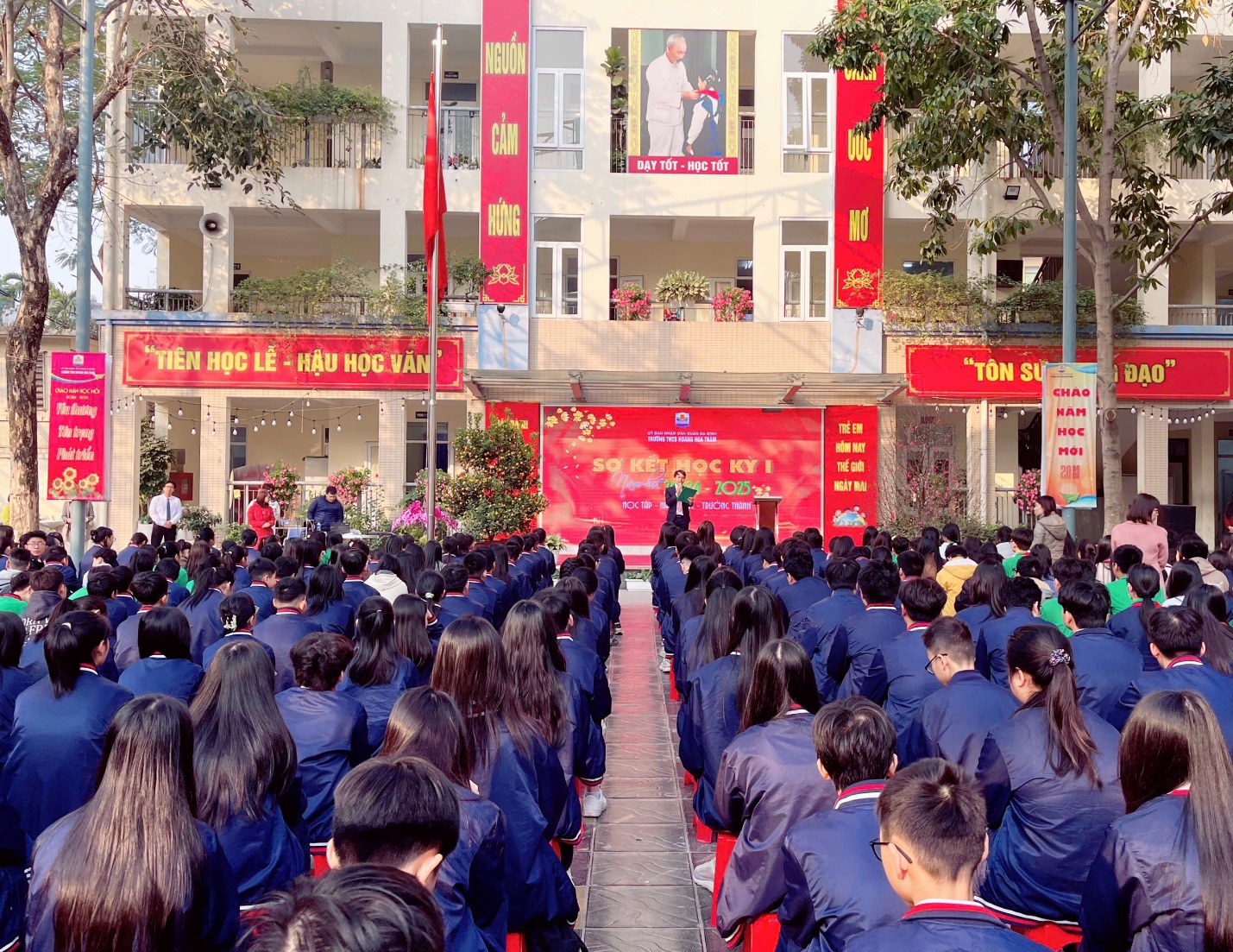 A group of people in blue uniformsDescription automatically generated