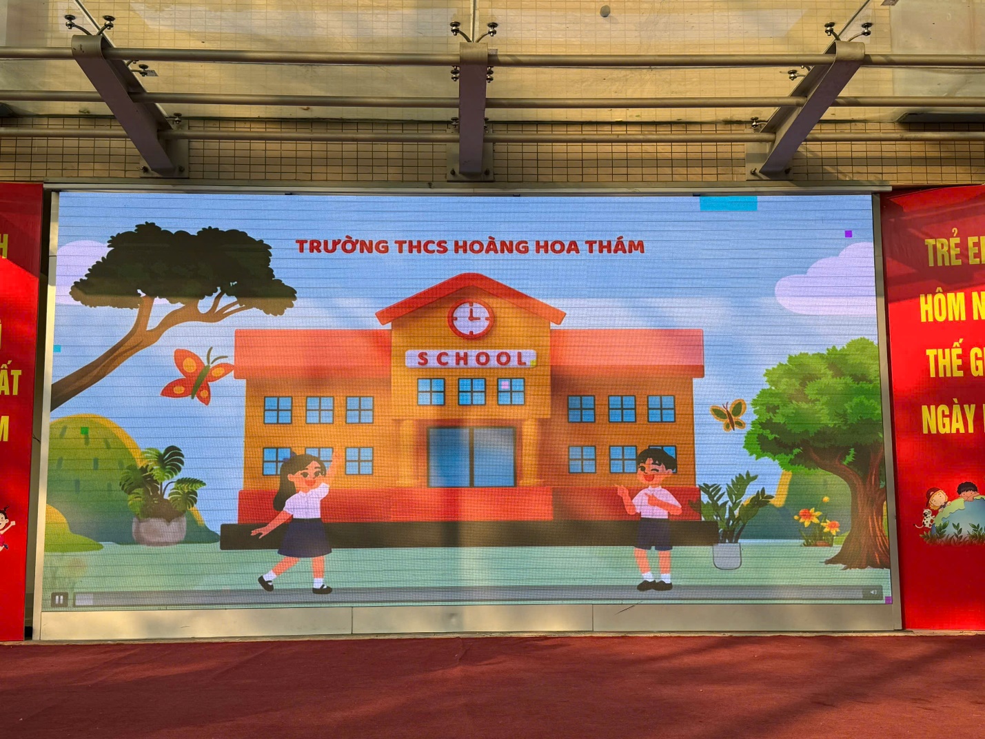 A mural of a school buildingDescription automatically generated