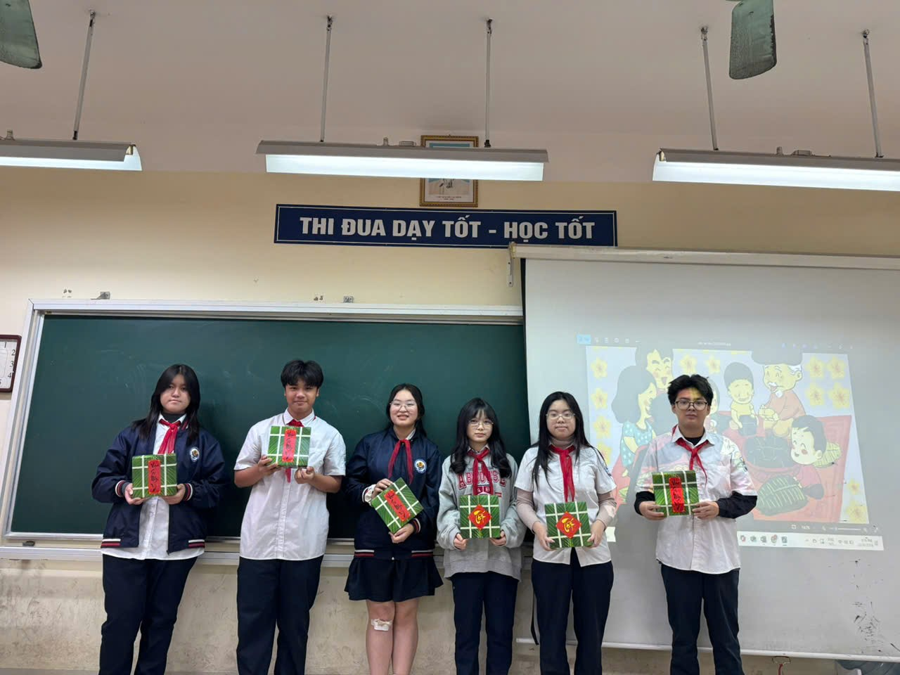 A group of people holding presents

Description automatically generated