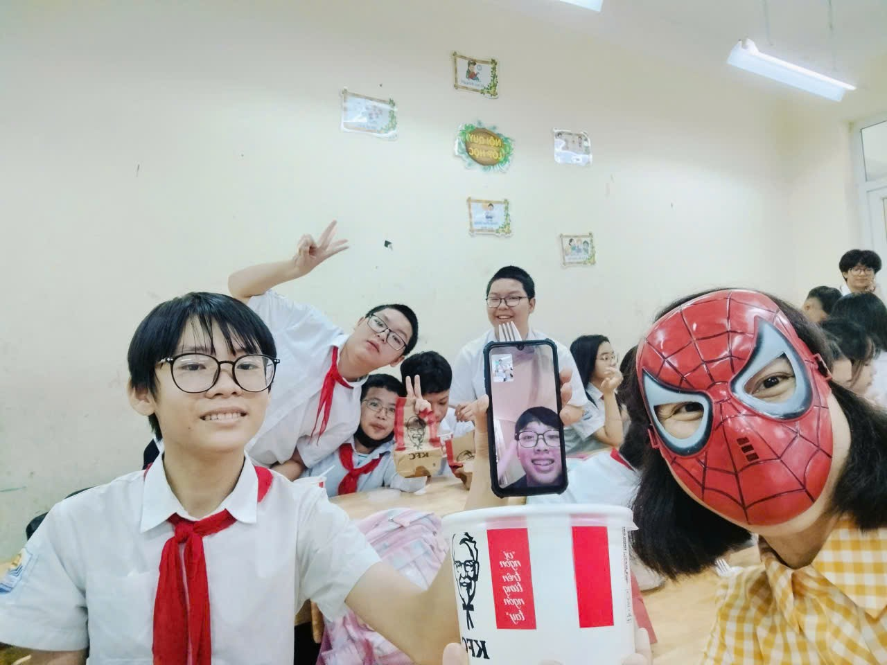 A group of people posing for a picture
Description automatically generated