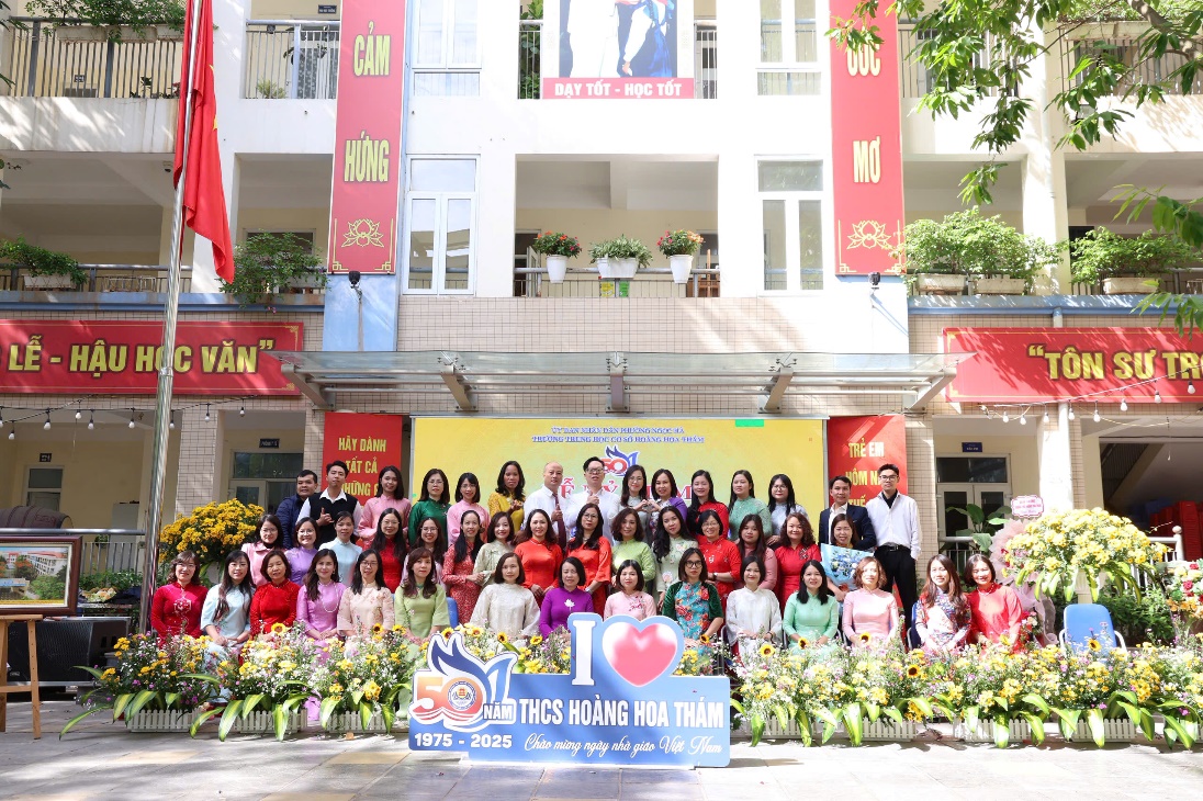 A group of people posing for a photoAI-generated content may be incorrect.