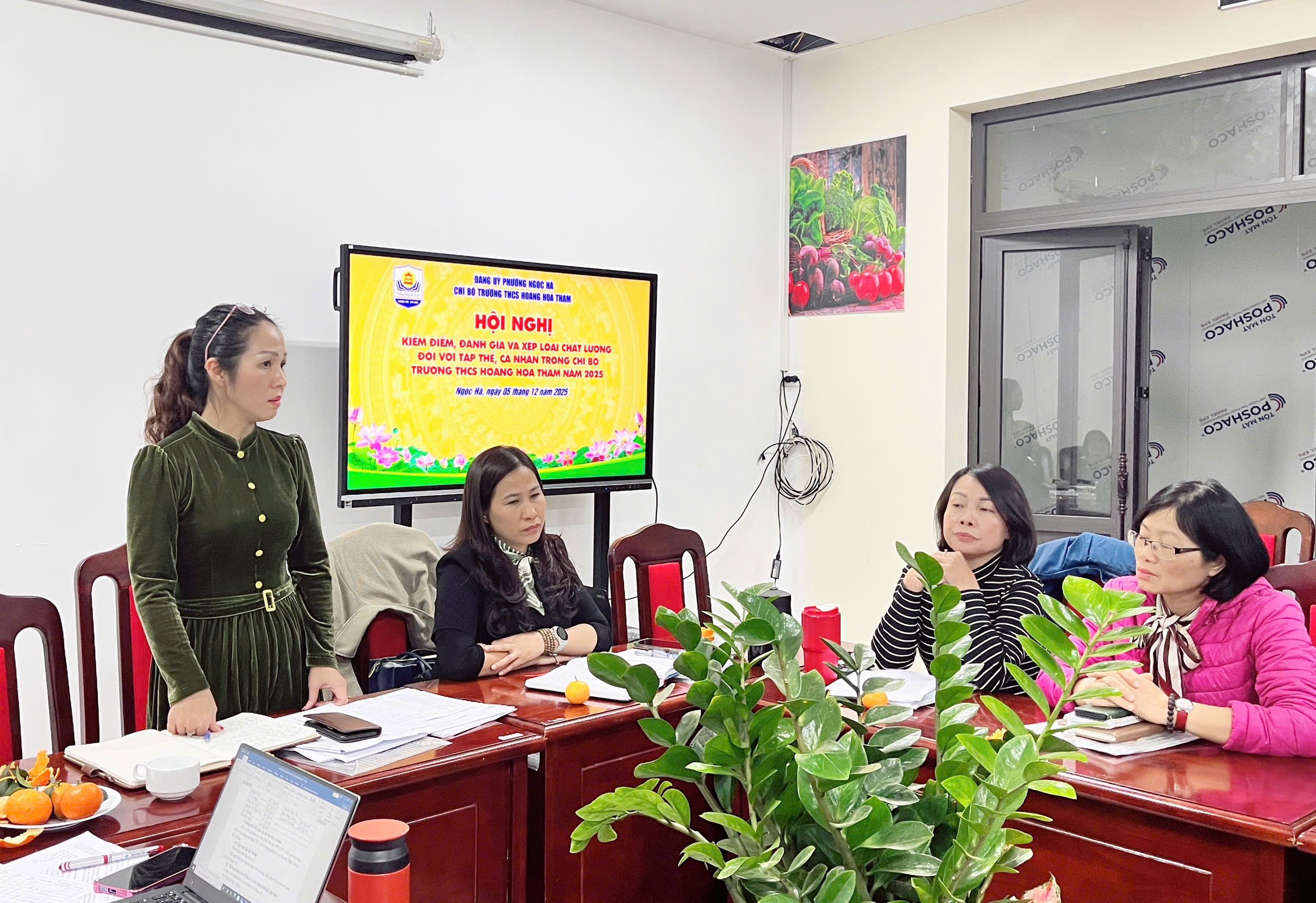 A group of women in a room
Description automatically generated