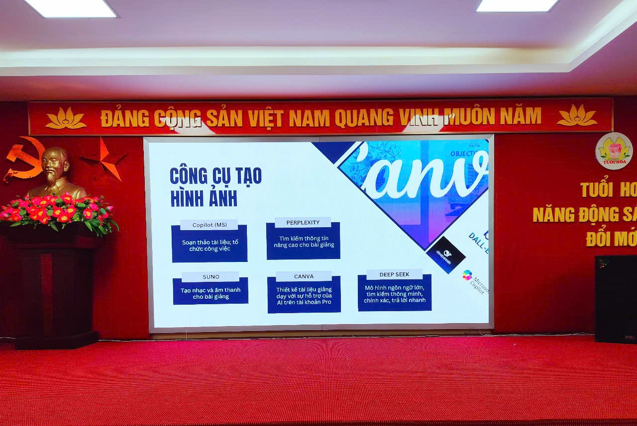 A large screen on a red carpetDescription automatically generated
