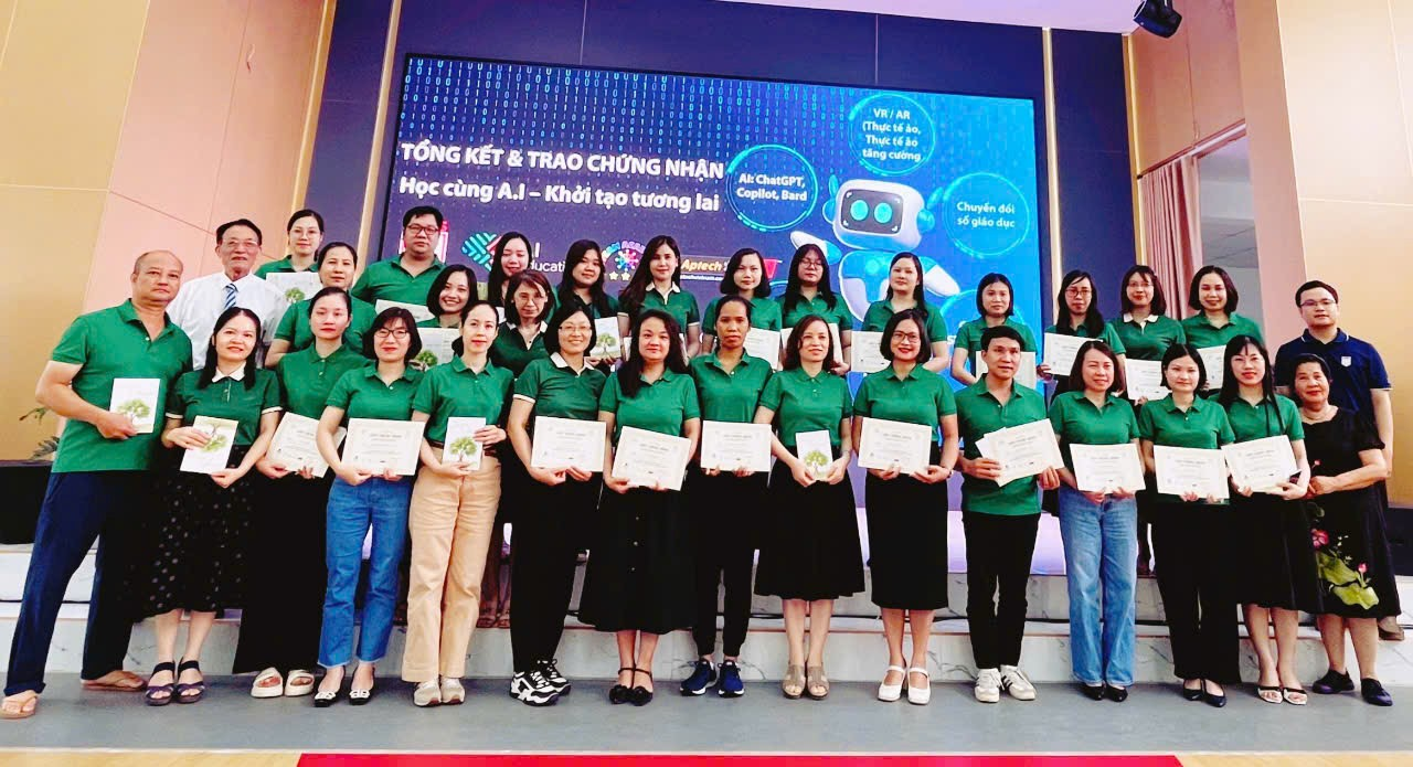 A group of women holding certificates

Description automatically generated