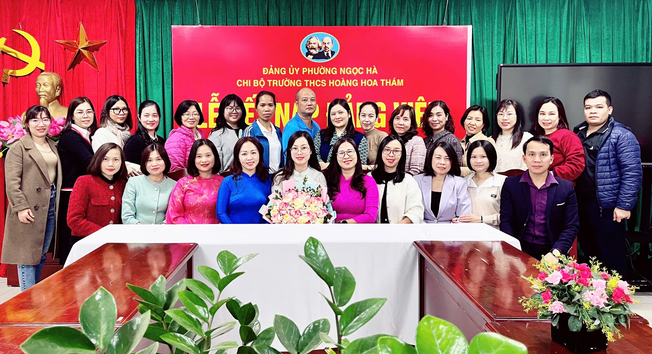 A group of people posing for a photoDescription automatically generated