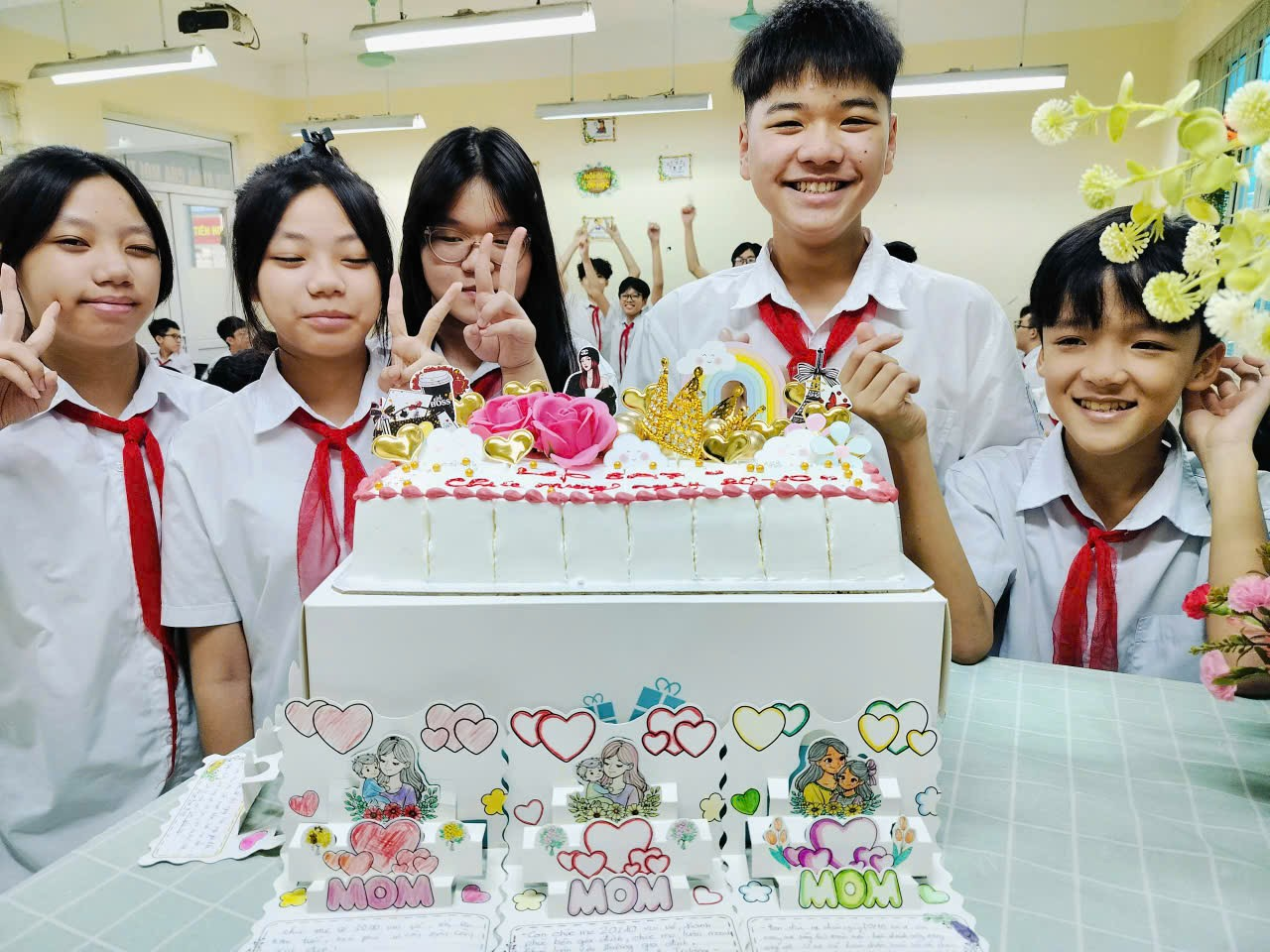 A group of people posing for a picture
Description automatically generated