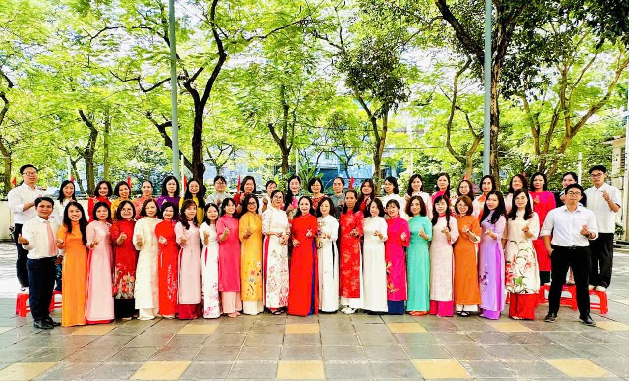 A group of women in traditional dressesDescription automatically generated