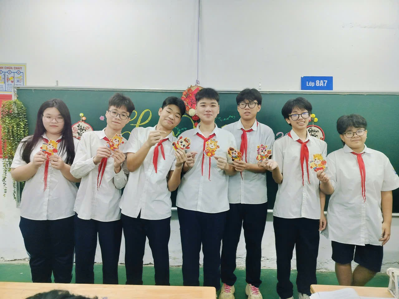 A group of people in white shirts
Description automatically generated