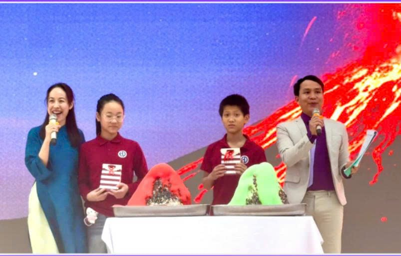 A group of people standing next to each otherDescription automatically generated
