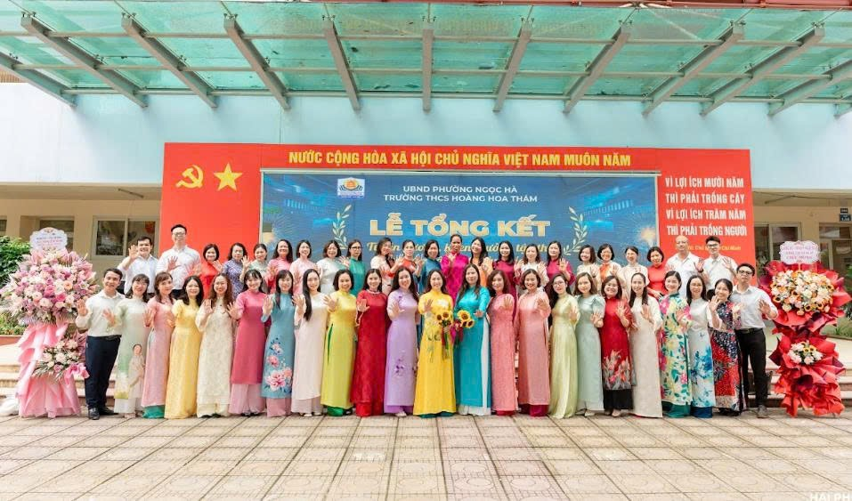 A group of people in colorful dresses

Description automatically generated